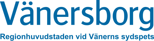 Bilden innehåller text i blå färg. På första raden står det Vänersborg, och på raden under står det Regionhuvudstaden vid Vänerns sydspets.